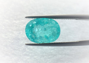 Natural Superb Neon Blue Paraiba weighing 6.39 CTS, oval shaped for sale!