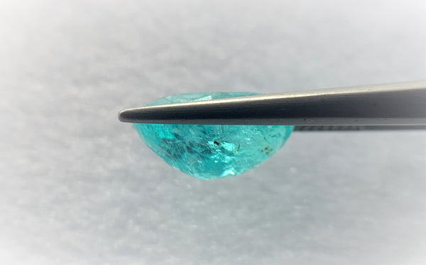 Natural Superb Neon Blue Paraiba weighing 6.39 CTS, oval shaped for sale!