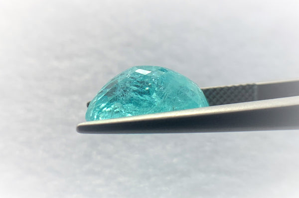 Natural Superb Neon Blue Paraiba weighing 6.39 CTS, oval shaped for sale!