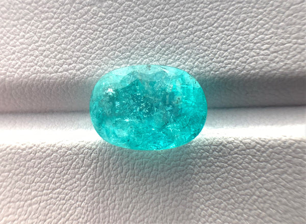 Natural Superb Neon Blue Paraiba weighing 6.39 CTS, oval shaped for sale!